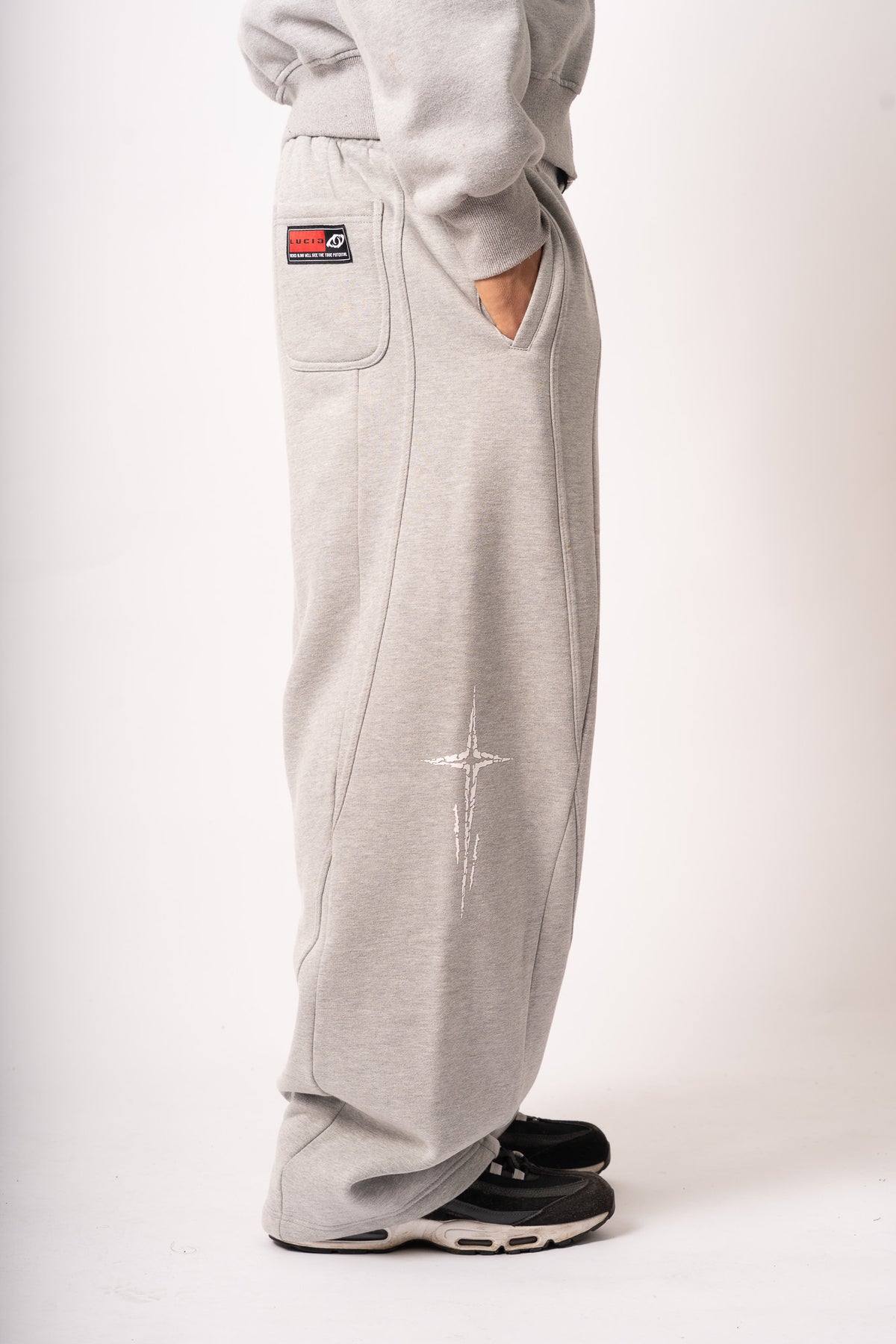 Jogging "Nova", gris, profil, détail poche arrière