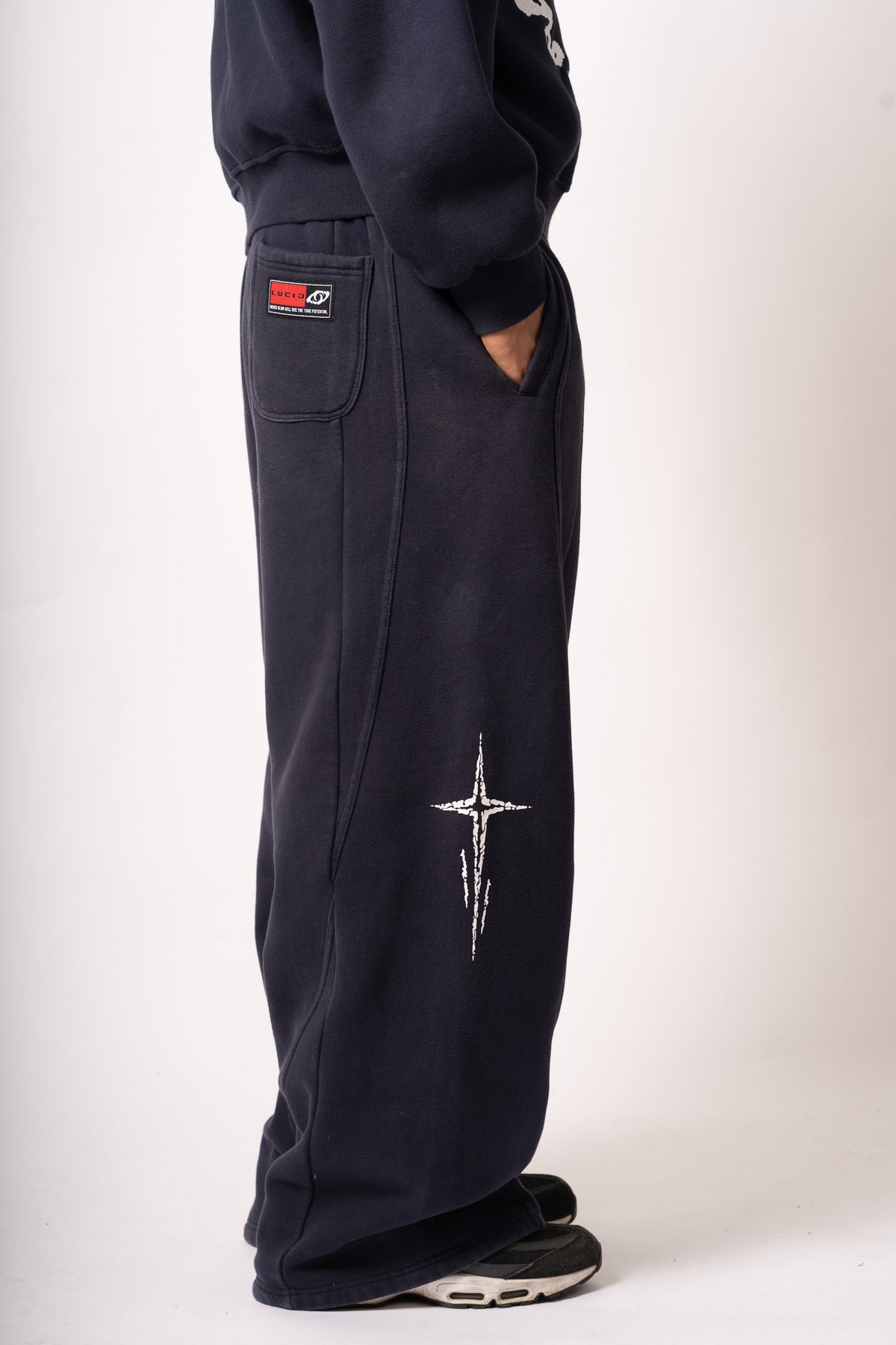Jogging "Nova", bleu marine, profil, détail étoile